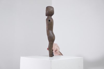 Lot 404 - A carved oak doll