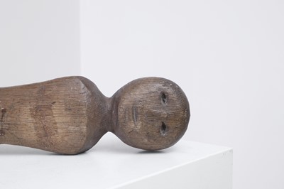 Lot 404 - A carved oak doll