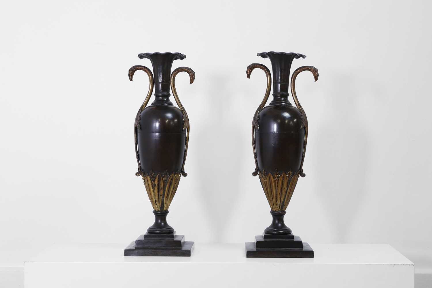 Lot 360 - A pair of bronze and ormolu urn vases