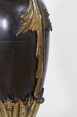 Lot 360 - A pair of bronze and ormolu urn vases