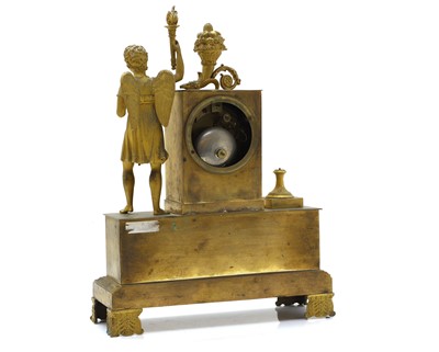 Lot 85 - A gilt-metal mantel clock
