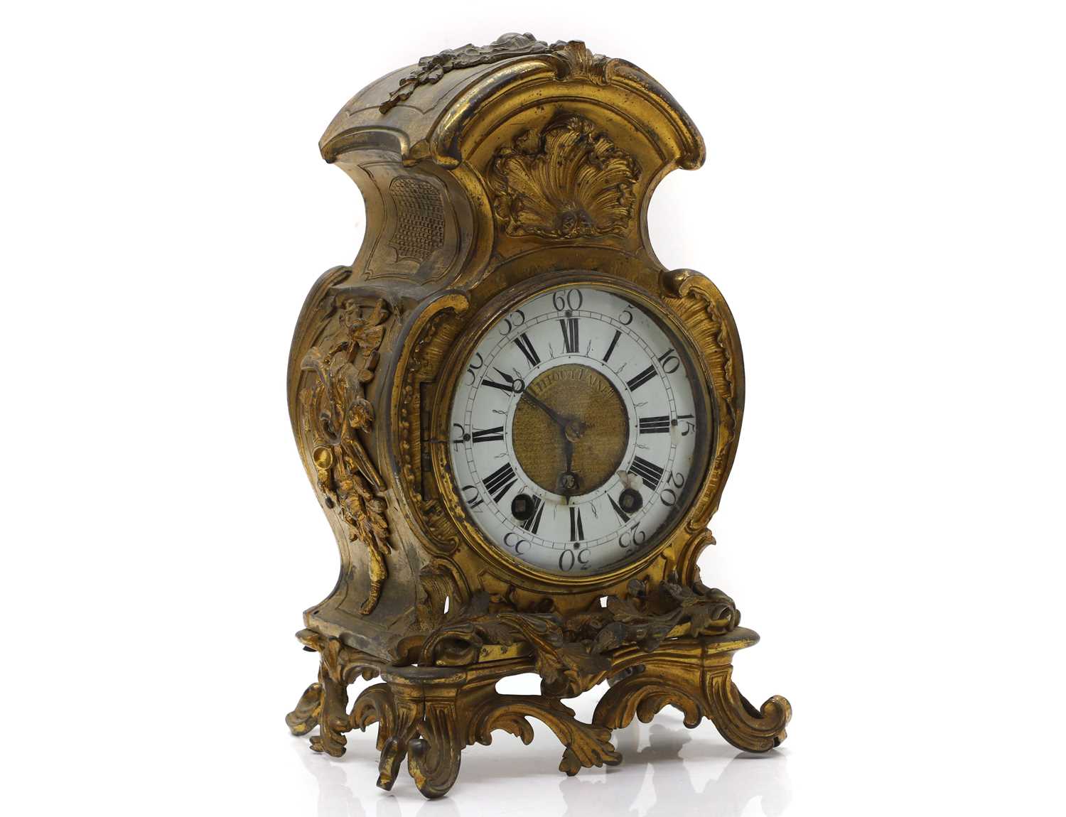 Lot 84 - A gilt metal mantel clock
