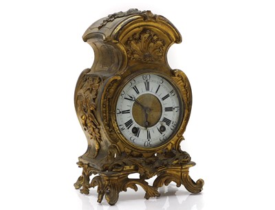 Lot 84 - A gilt metal mantel clock