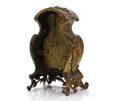 Lot 84 - A gilt metal mantel clock