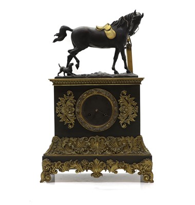 Lot 83 - A gilt and patinated bronze mantel clock
