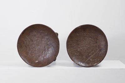Lot 412 - A pair of carved Igbo stools