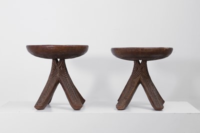 Lot 412 - A pair of carved Igbo stools