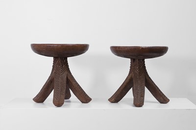 Lot 412 - A pair of carved Igbo stools