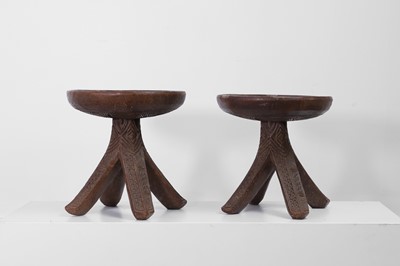Lot 412 - A pair of carved Igbo stools