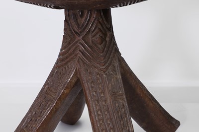 Lot 412 - A pair of carved Igbo stools