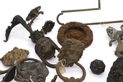 Lot 163 - A large group of metal door knockers