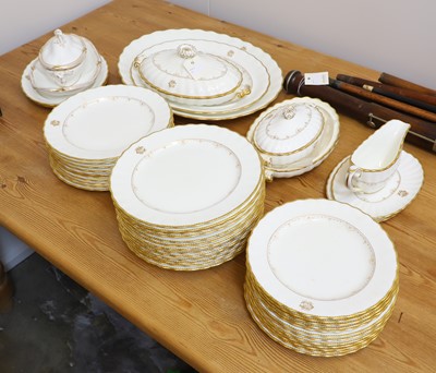 Lot 64 - A Royal Doulton white and gilt porcelain dinner service