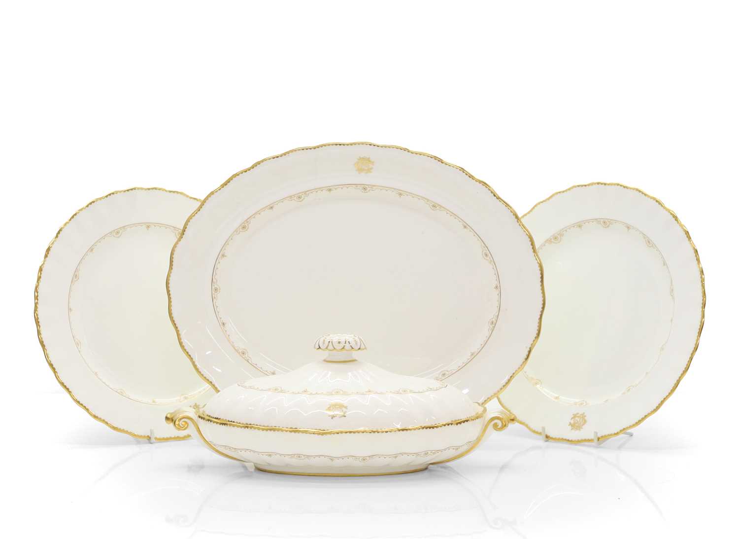 Lot 64 - A Royal Doulton white and gilt porcelain dinner service