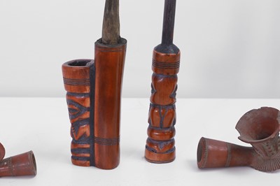 Lot 435 - A Bamum stained bone tobacco pipe