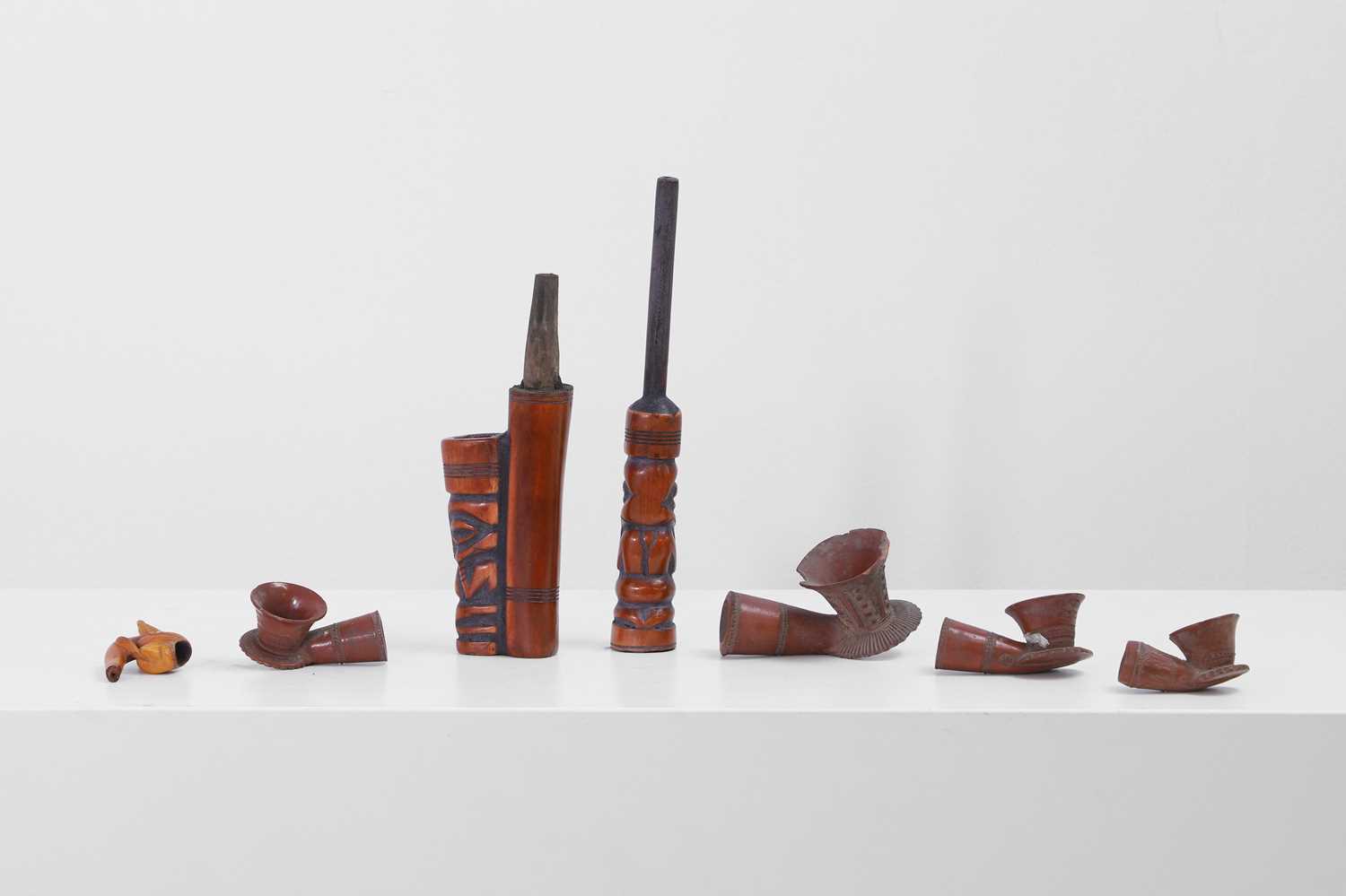 Lot 435 - A Bamum stained bone tobacco pipe