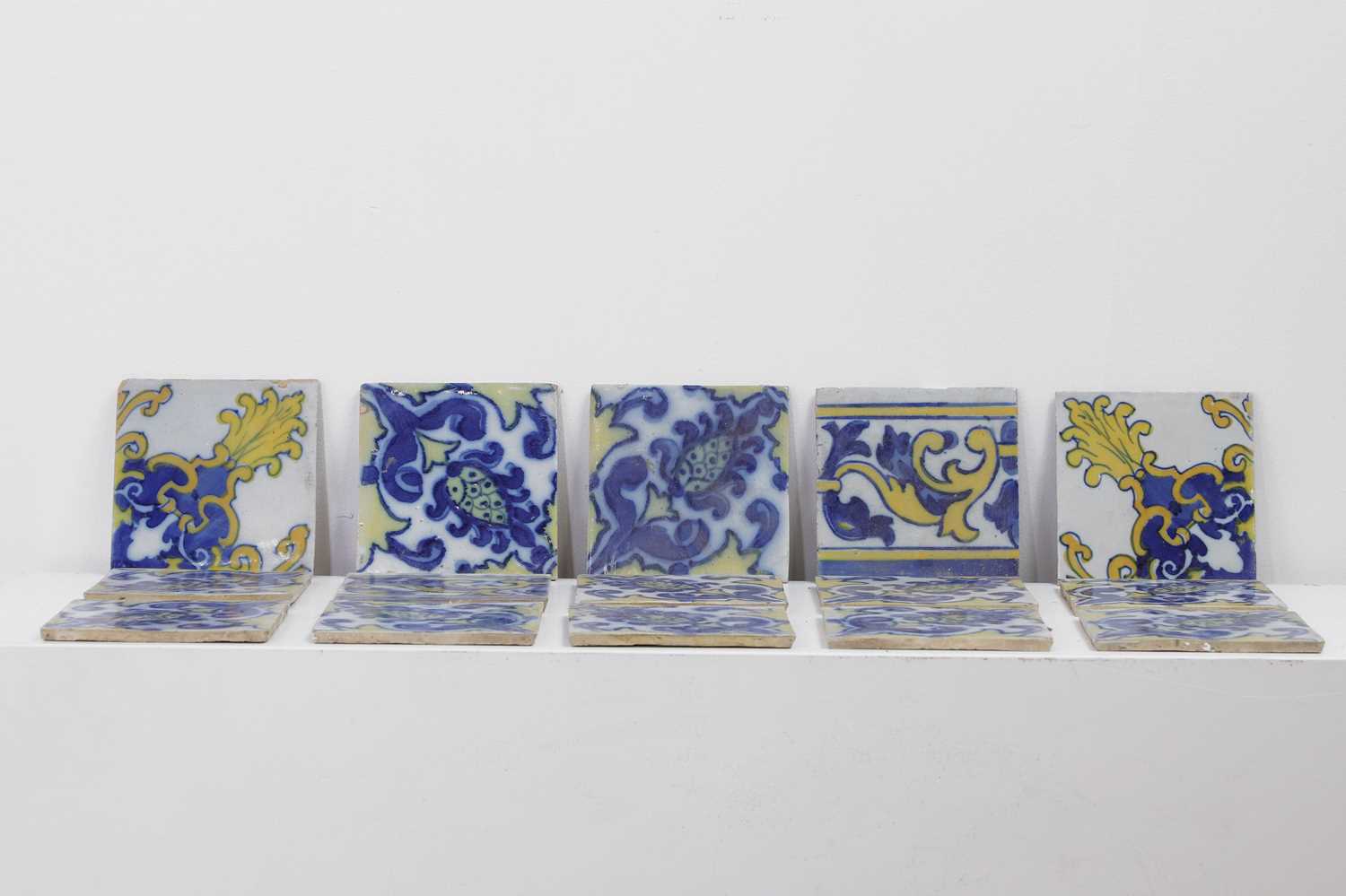 Lot 432 - A collection of tin-glazed tiles