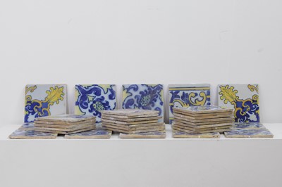 Lot 432 - A collection of tin-glazed tiles