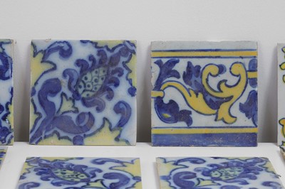 Lot 432 - A collection of tin-glazed tiles