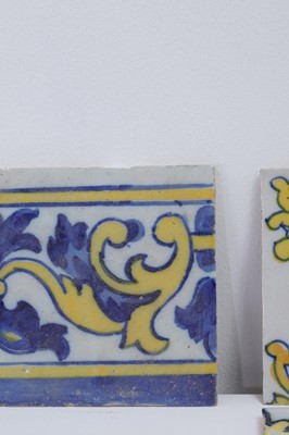 Lot 432 - A collection of tin-glazed tiles