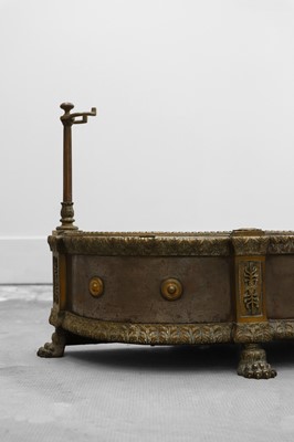 Lot 159 - A steel and brass fire kerb