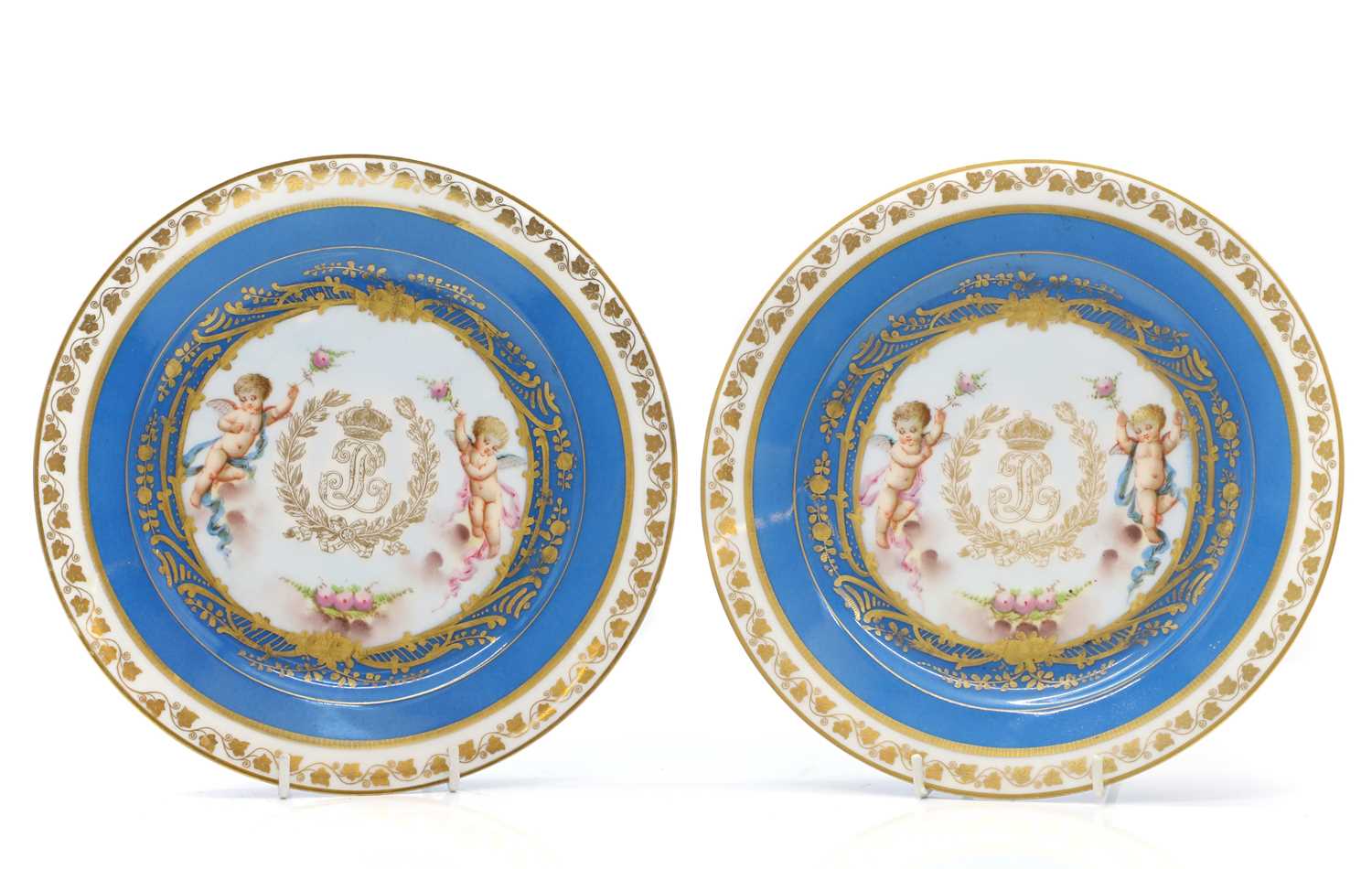 Lot 73 - A pair of Sevres 'Chateau des Tuileries' porcelain plates