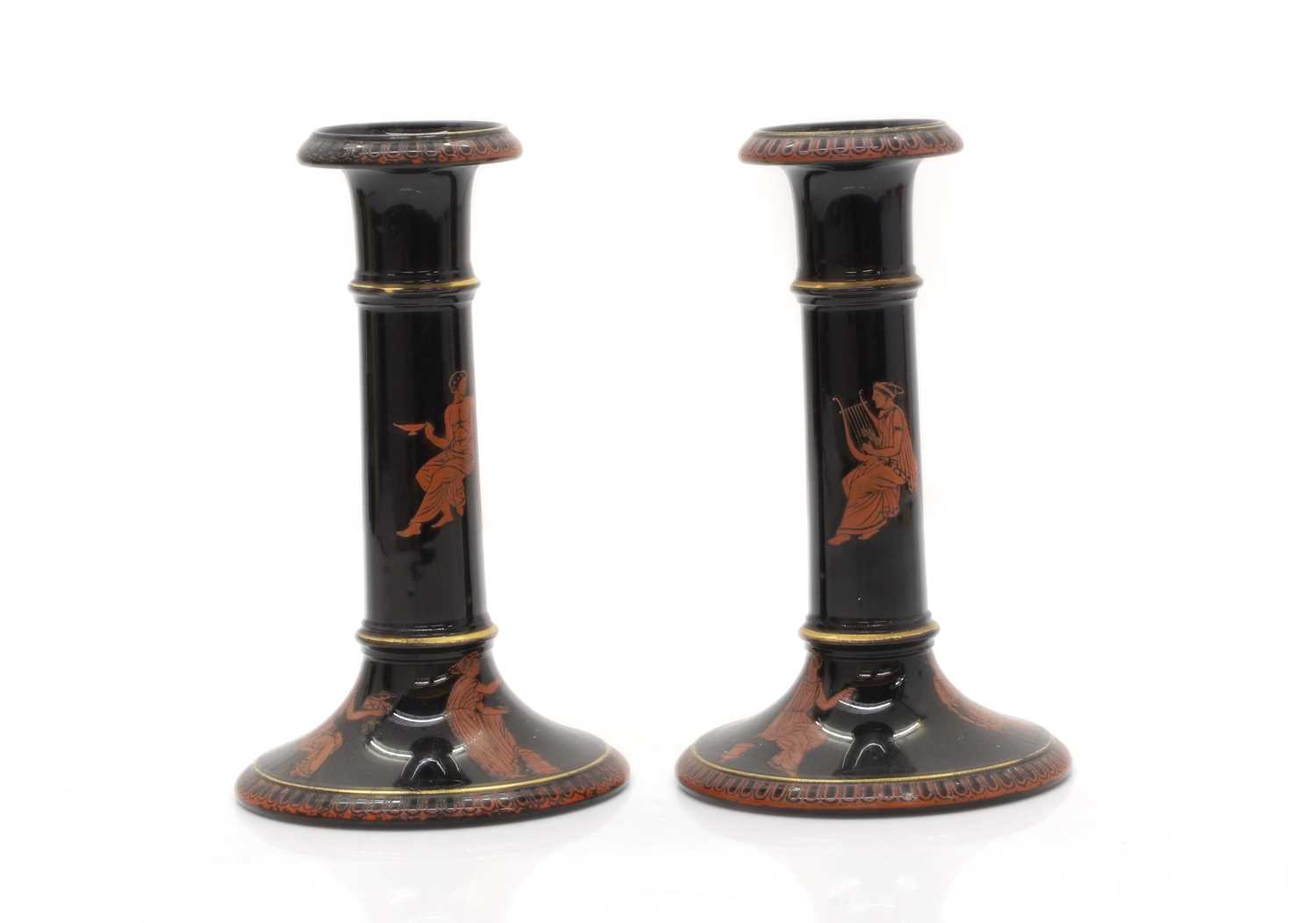 Lot 59 - A pair of Grecian-style candlesticks