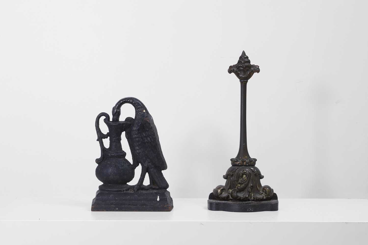 Lot 328 - Two metal door porters