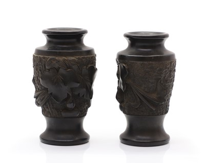Lot 114 - A pair of carved hardwood vases