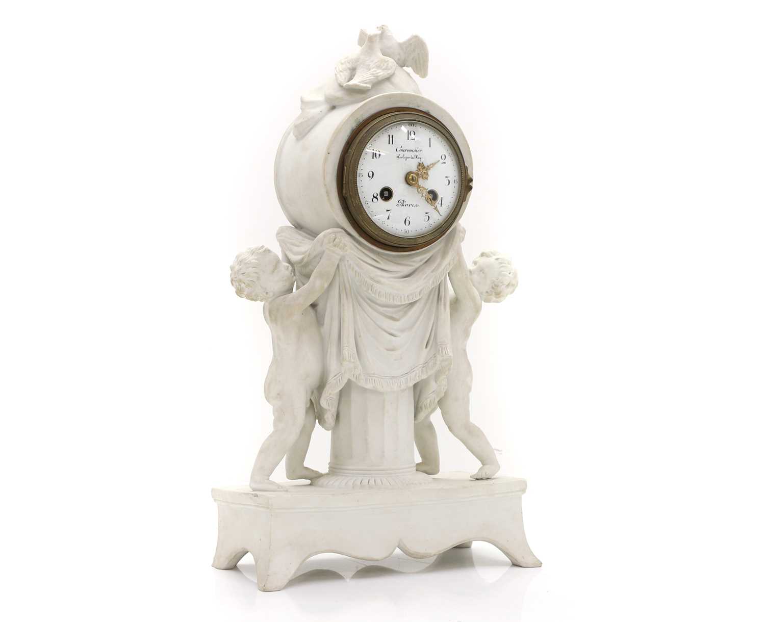 Lot 87 - A bisque porcelain mantel clock