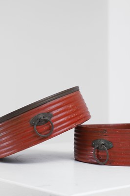 Lot 401 - A pair of Regency red-lacquered coasters