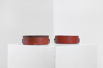 Lot 401 - A pair of Regency red-lacquered coasters