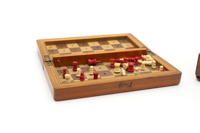 Lot 79 - A travel game of dominoes