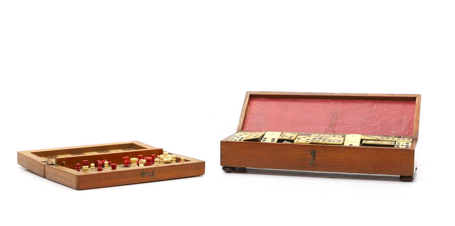 Lot 79 - A travel game of dominoes