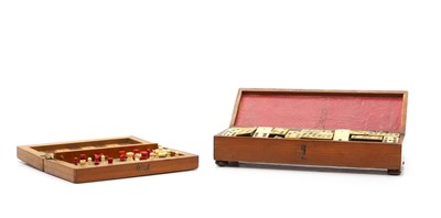 Lot 79 - A travel game of dominoes