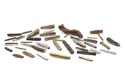 Lot 108 - A large collection of penknives and corkscrews