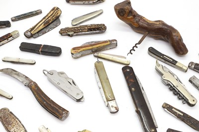 Lot 108 - A large collection of penknives and corkscrews