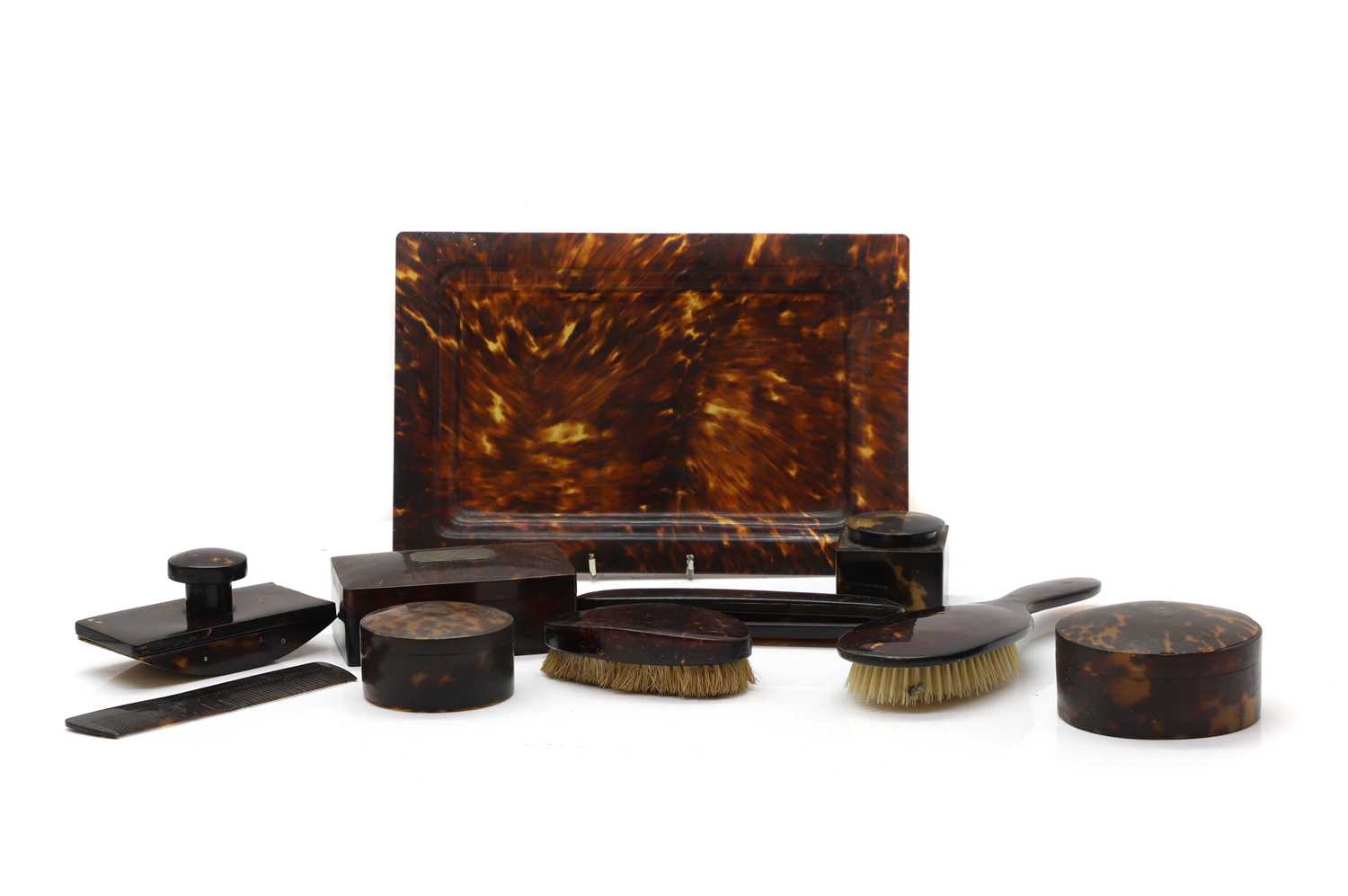 Lot 105 - A collection of tortoiseshell dressing table items