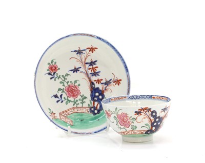 Lot 57 - A Lowestoft style cup and saucer