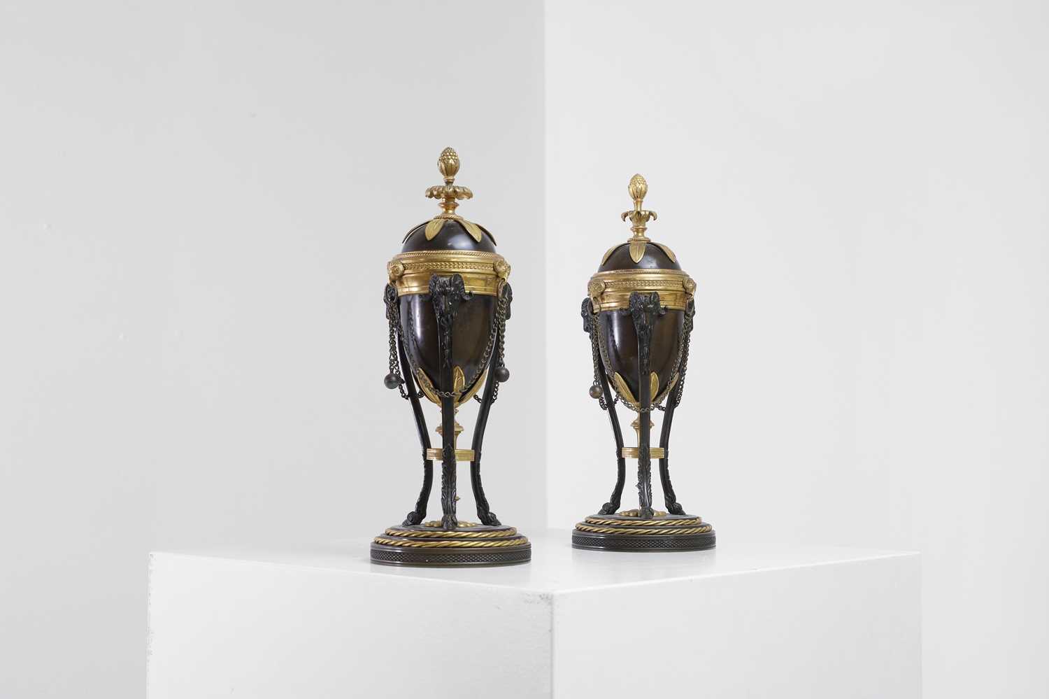 Lot 414 - A pair of gilt and patinated bronze cassolettes