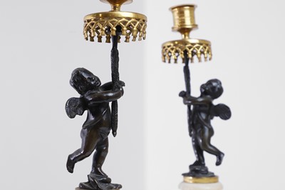 Lot 310 - A pair of Louis XVI-style ormolu, patinated bronze and marble candlesticks