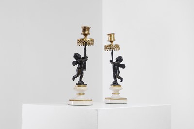 Lot 310 - A pair of Louis XVI-style ormolu, patinated bronze and marble candlesticks