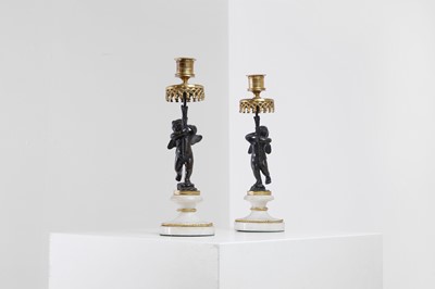 Lot 310 - A pair of Louis XVI-style ormolu, patinated bronze and marble candlesticks