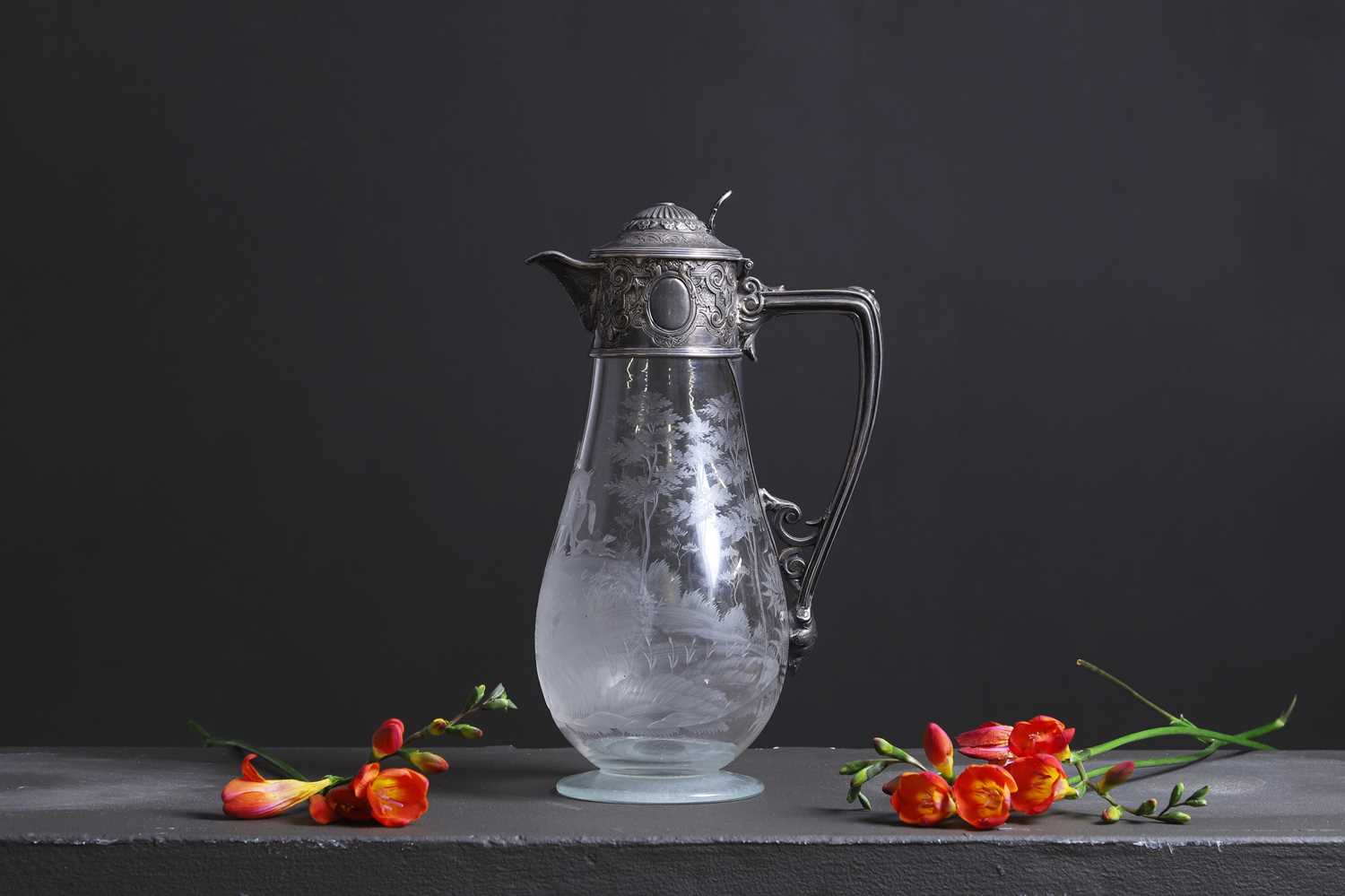 Lot 438 - A Victorian silver-mounted and etched glass claret jug