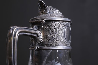 Lot 438 - A Victorian silver-mounted and etched glass claret jug