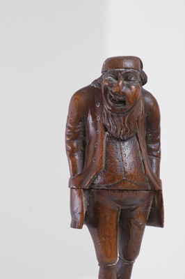 Lot 396 - A Black Forest carved nutcracker