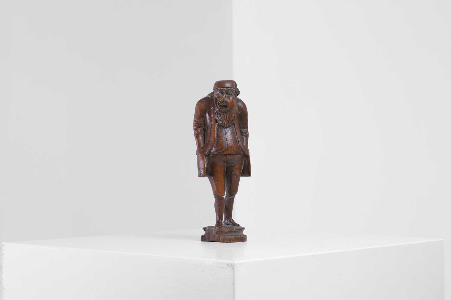 Lot 396 - A Black Forest carved nutcracker