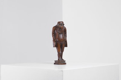 Lot 396 - A Black Forest carved nutcracker