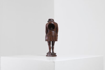 Lot 396 - A Black Forest carved nutcracker