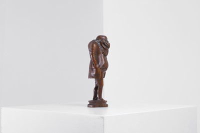 Lot 396 - A Black Forest carved nutcracker