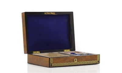 Lot 136 - A Victorian walnut games box